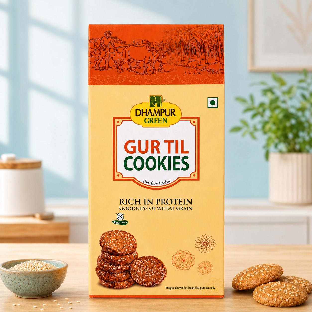 A box of Dhampur Green Gurtil Cookies stands on a wooden table in a bright kitchen setting, with loose cookies and a small bowl nearby. The packaging is cream and orange with red and green text, and the brand name Dhampur Green is clearly visible.
