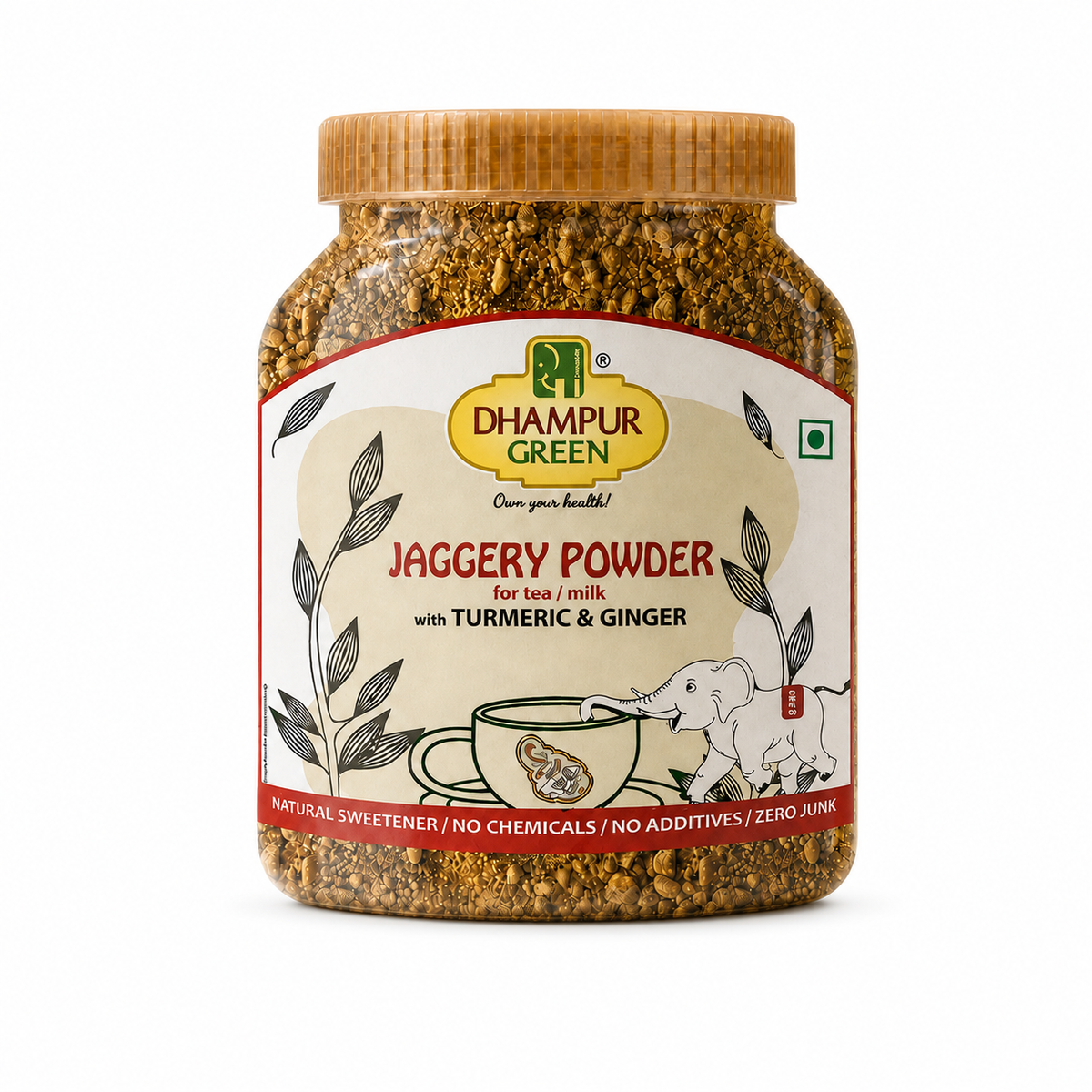 A jar of Dhampur Green Jaggery Powder with turmeric and ginger, featuring a light brown bamboo-style lid and a cream-colored label with red and green accents, set against a plain white background.