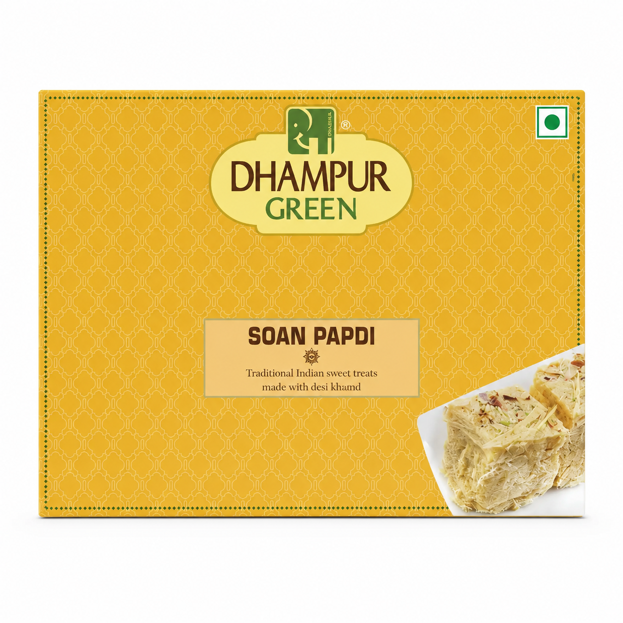 A box of 2&1 Dhampur Green Soan Papdi (Traditional Indian Sweet Treats) on a white background. The packaging is a warm mustard yellow with a subtle geometric pattern, featuring the brand logo and a small image of the baked papdi treats on the bottom right.