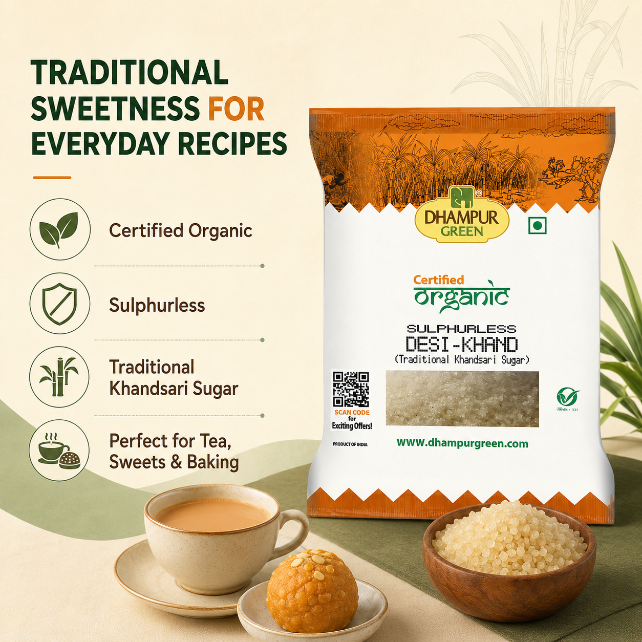 A bag of Dhampur Green Traditional Khand Sugar stands on a styled tabletop with a cup of tea, a small fried sweet, and a bowl of granulated sugar. Text on the left highlights organic certification, sulphur-free quality, traditional khandsari sugar, and suitability for tea, sweets, and baking.